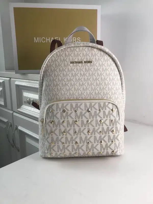 MK Rhea printed studded shoulder bag Model: 2106: Size: 26m Height: 32 Width: 14